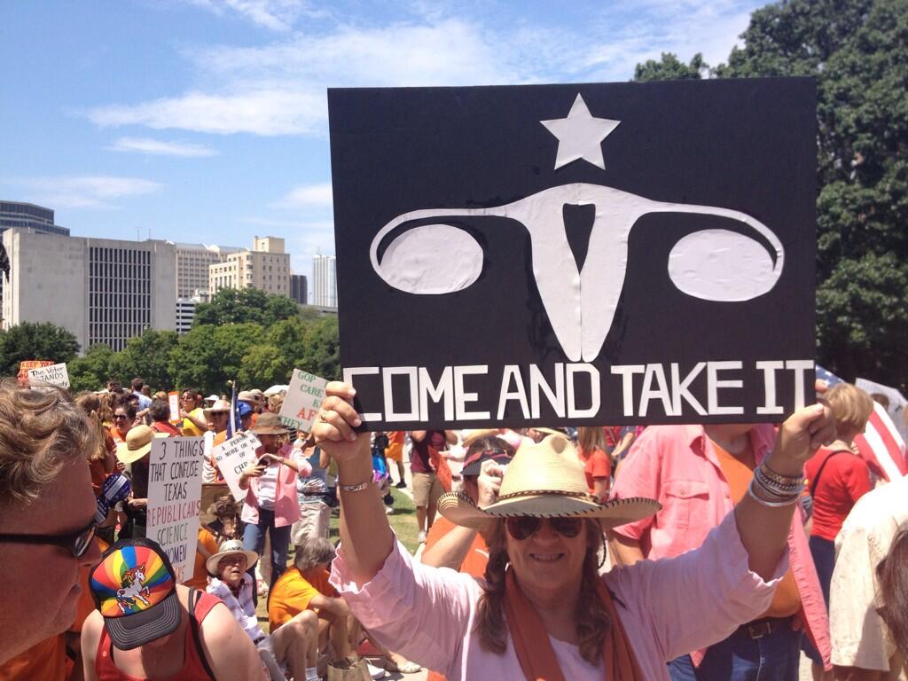 Texas rally sign reads 