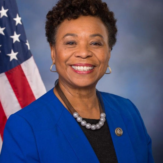Headshot image of Representative Barbara Lee in front of the U.S. flag