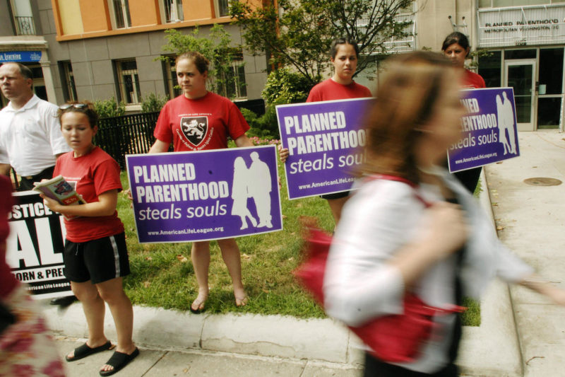 [Photo: Anti-abortion activists protest outside D.C. Planned Parenthood].