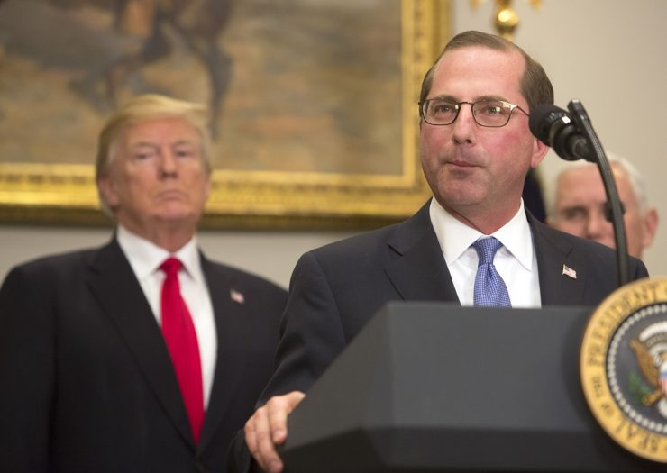 [Photo: Secretary of the Department of Health and Human Services, Alex Azar speaks at a podium after being sworn in by President Donald Trump.]