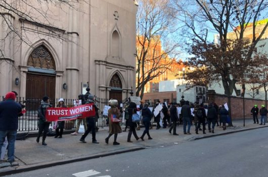 [Photo: Anti-choice protesters walk from St. Patrick's Old Cathedral to Planned Parenthood in Manhattan.]