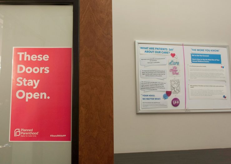 [Photo: A sign in a Planned Parenthood that reads 