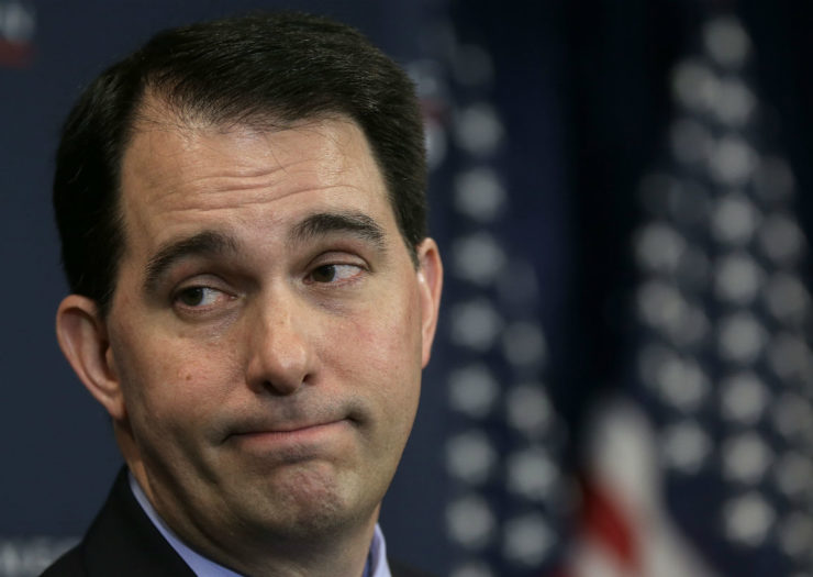 Gov. Scott Walker's face with an American flag in the background.