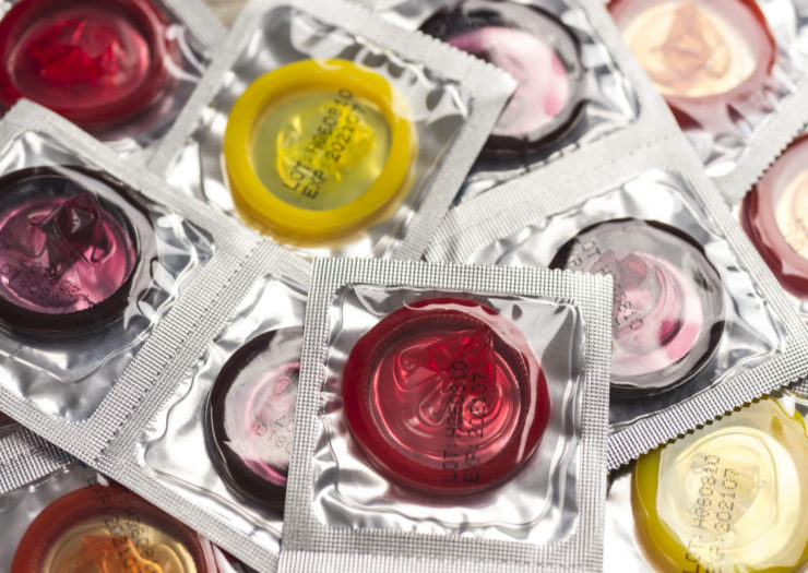 [Photo: A pile of condoms]