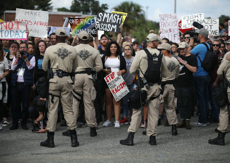 [photo: protesters gather at the University of Florida in Gainesville, Florida, before a speech by alt-right organizer Richard Spencer.]