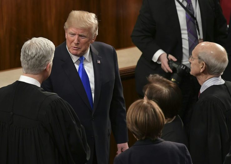 [Photo: President Donald Trump speaks with U.S. Supreme Court justices]