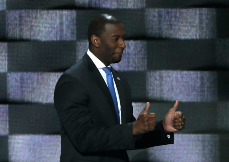 [Photo: Andrew Gillum giving a thumbs up.]