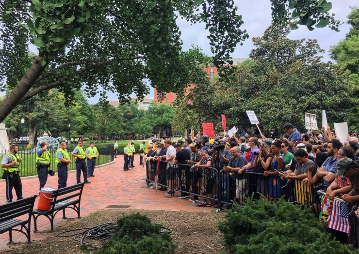 [Photo: A counter Unite the Right Rally gathered outside of the White House in D.C. on August 12.]