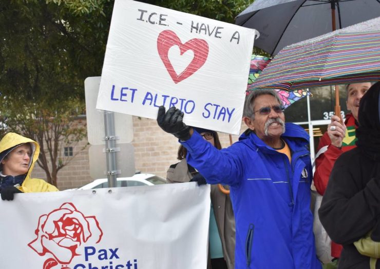 [Photo: Advocate rallying to support sanctuary leader Alirio Gámez in North Carolina.]