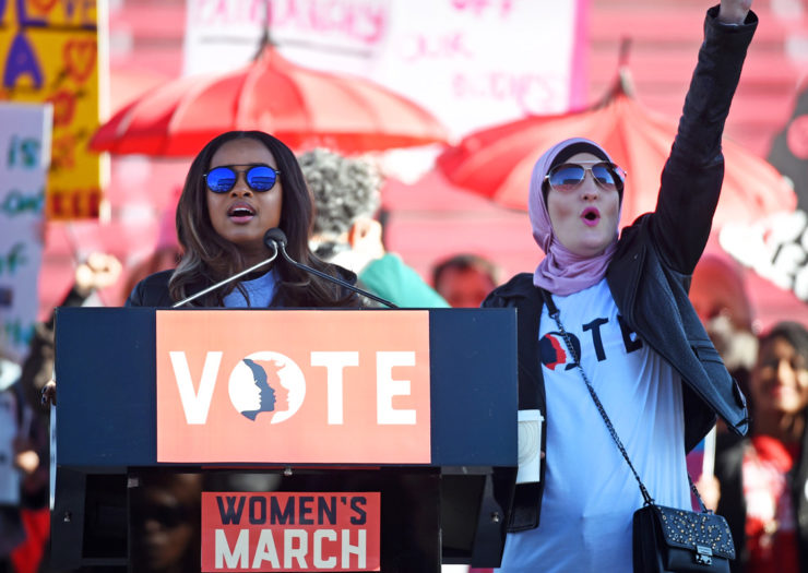 [Photo: Tamika D. Mallory, on the left, and Linda Sarsour speak at the Women's March.]