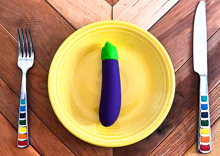 [Photo: An eggplant vibrator lies on a plate.]