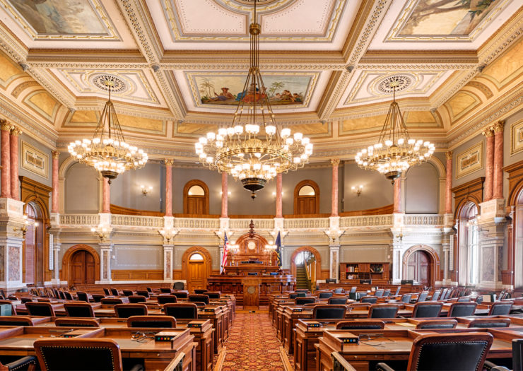 [Photo: House of Representatives chamber of the Kansas State Capitol.]