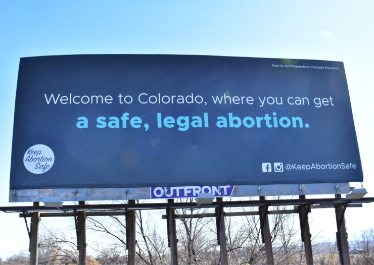 [Photo: A billboard in Colorado that reads 