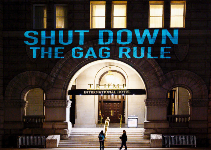 [Photo: Activists project a message onto the Trump International Hotel, to protest the Global Gag Rule .]