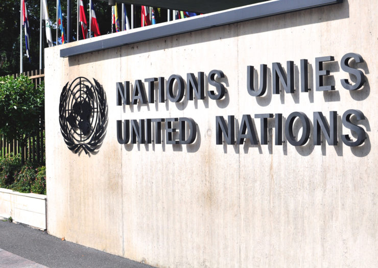 [Photo: The United Nation sign in Geneva.]