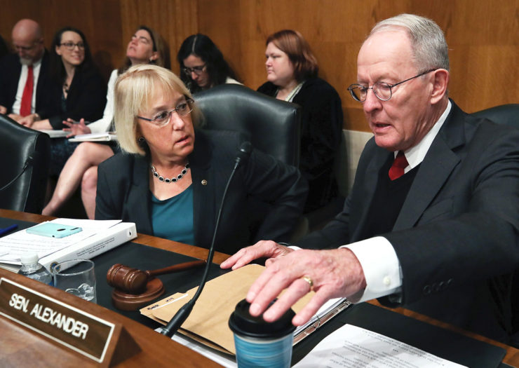 [Photo: Committee Chair Lamar Alexander (R-TN) and ranking member Sen. Patty Murray (D-WA) confer during a hearing.]