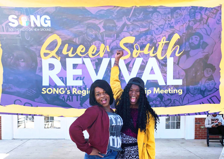 [Photo: Kayla Gore stands with TLC’s organizing program associate Micky Bradford in front of an oversized purple banner that reads 
