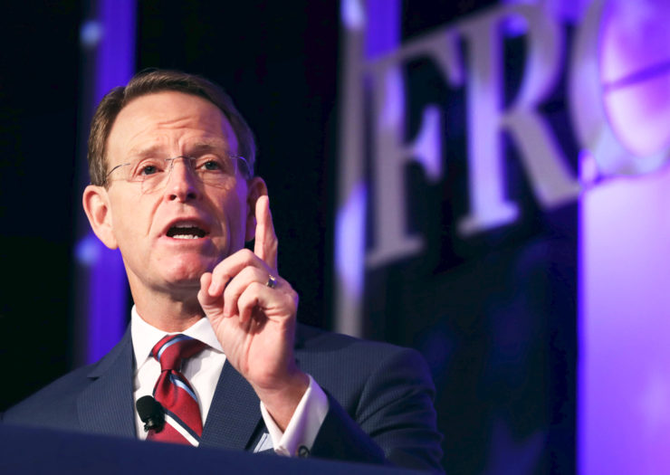 [Photo: Tony Perkins gestures with his hand as he delivers remarks at the opening of an event.]