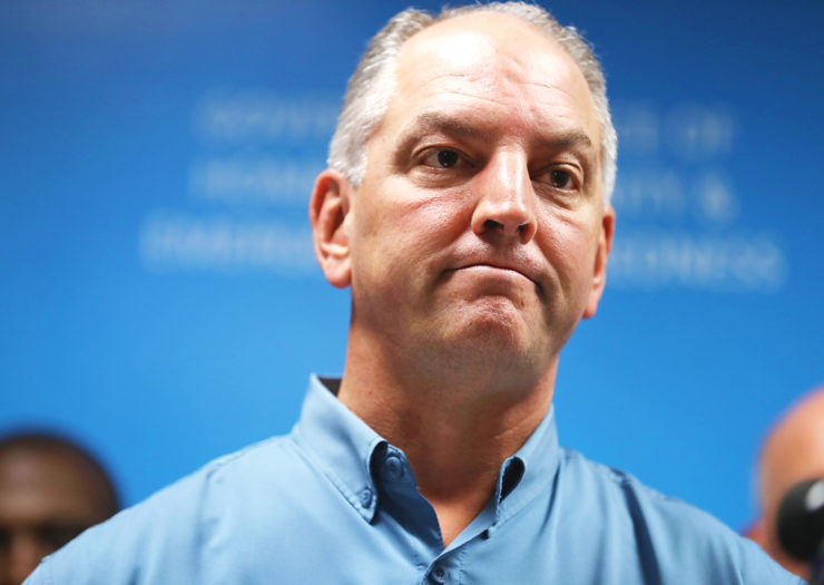 [Photo: Louisiana Governor John Bel Edwards speaks during a press conference.]