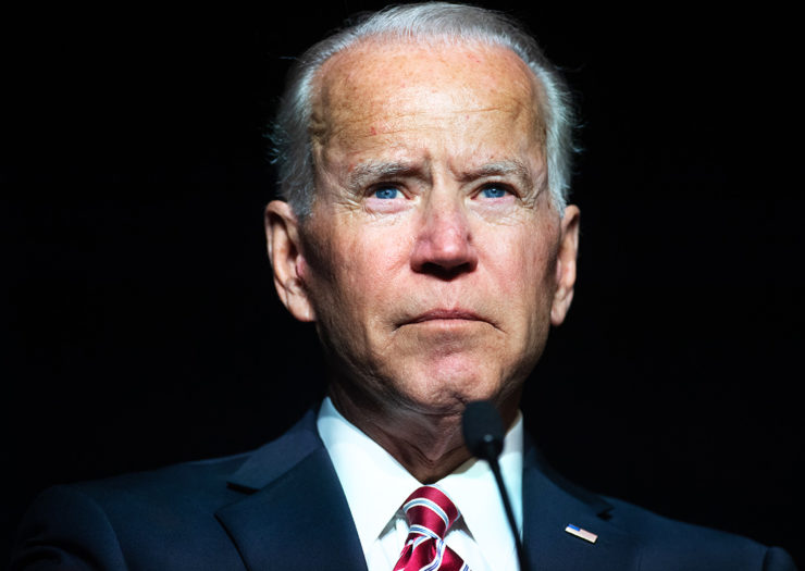 [Photo: Former Vice President Joe Biden looks intensely during an event.]