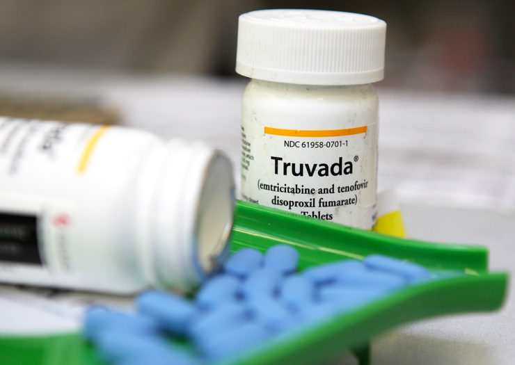 [Photo: Close-up of Truvada bottles and pills.]
