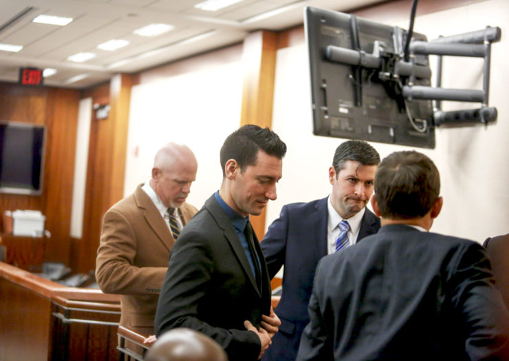 [Photo: David Daleiden and his legal team prepare to leave the courtroom.]