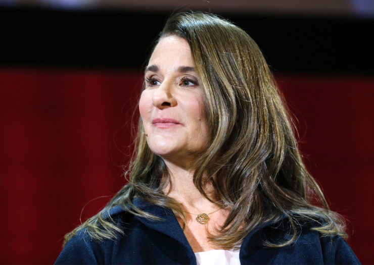 [Photo: Melinda Gates looks on during an event.]