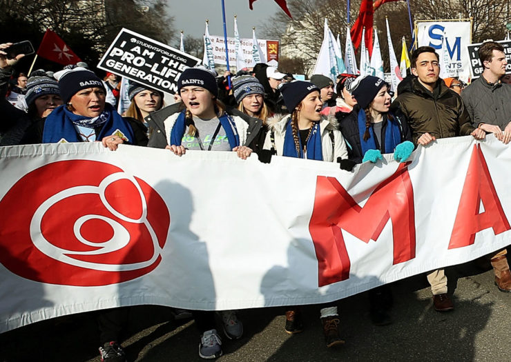 [Photo: Anti-abortion supports participate in the annual March For Life rally.]