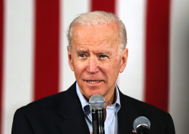 [Photo: Democratic presidential candidate former Vice President Joe Biden addresses a crowd.]