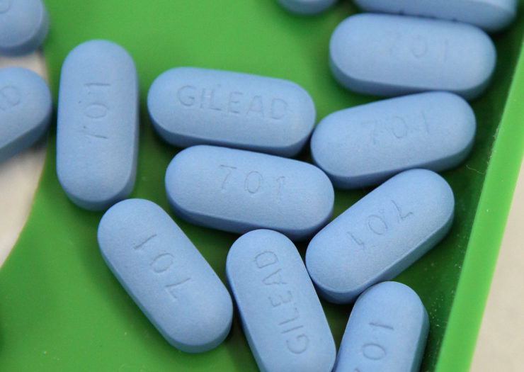 [Photo: Blue pills in a green tray, the pills have '701' and 'Gilead' imprinted on them.]