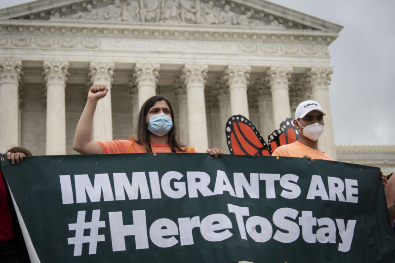 DACA recipients and their supporters rally outside the Supreme Court.