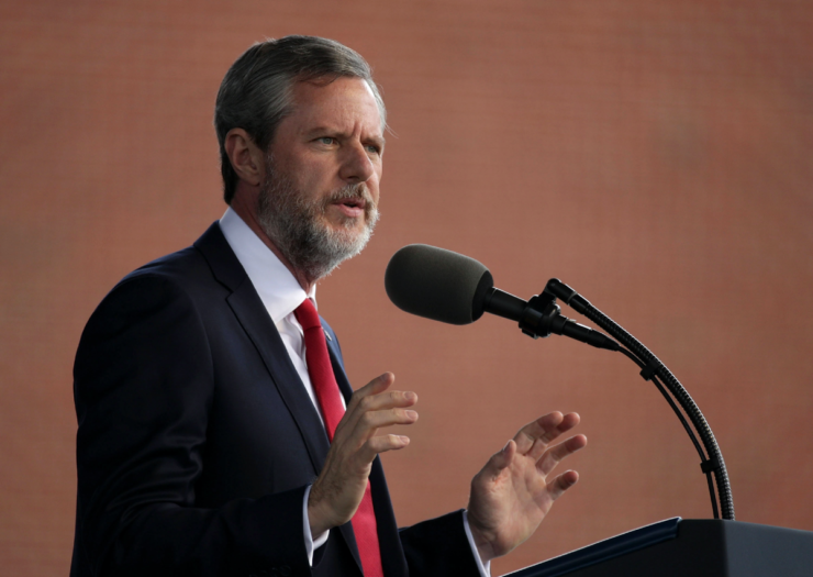 [Photo: Jerry Falwell speaking during a commencement ceremony]