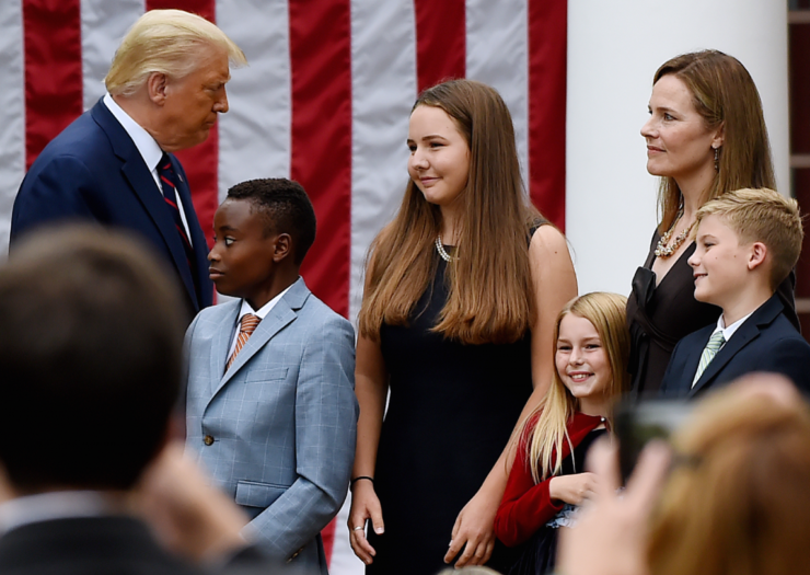 [PHOTO: Amy Coney Barrett and her children with Donald Trump]