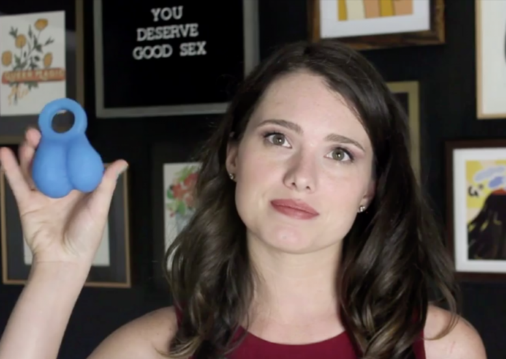 [PHOTO: Screenshot of host Cassandra Corrado holding plastic blue balls on You Deserve Good Sex]