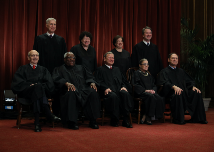 [PHOTO: The Supreme Court in an official group photo]