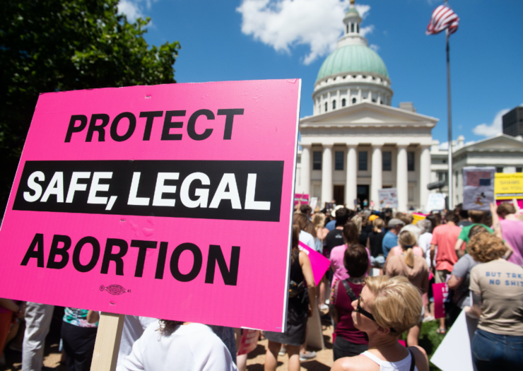 [PHOTO: Abortion rights protest sign that reads: Protect safe, legal abortion