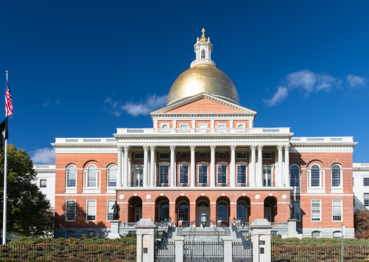 [PHOTO: The front of the Massachusetts State House]
