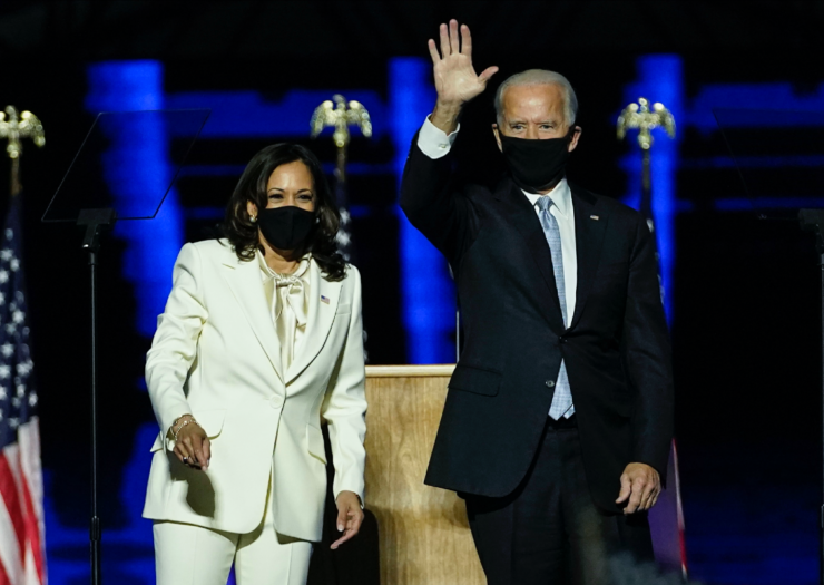 [PHOTO: Kamala Harris and Joe Biden in masks looking at the camera]