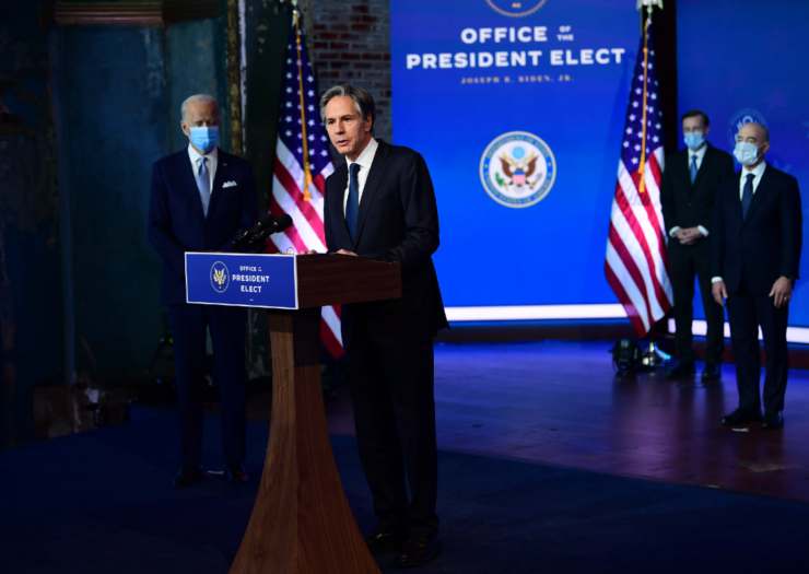 [PHOTO: Antony Blinken speaking in front of the Office of President-Elect podium]