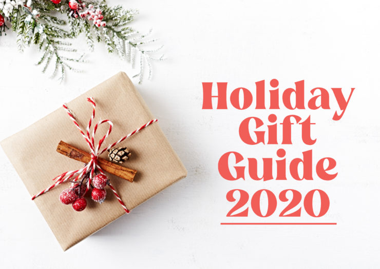 [Photo: A present wrapped in kraft paper is adorned with a cinnamon stick, pine cones and berries. To the right is red text that reads 'Holiday Gift Guide 2020.']