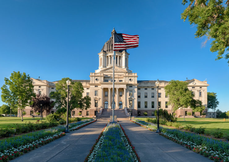 [PHOTO: Exterior of South Dakota State Capitol building]