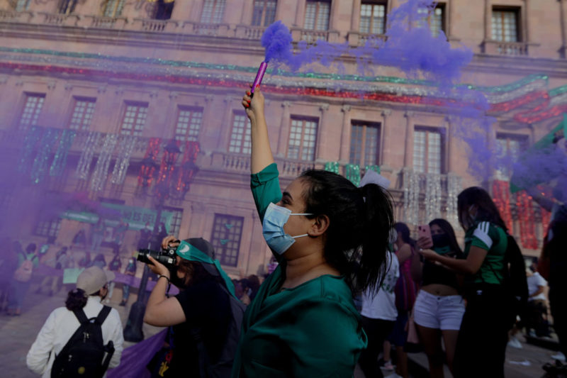 Photo of woman and others relying after Mexico decriminalized abortion