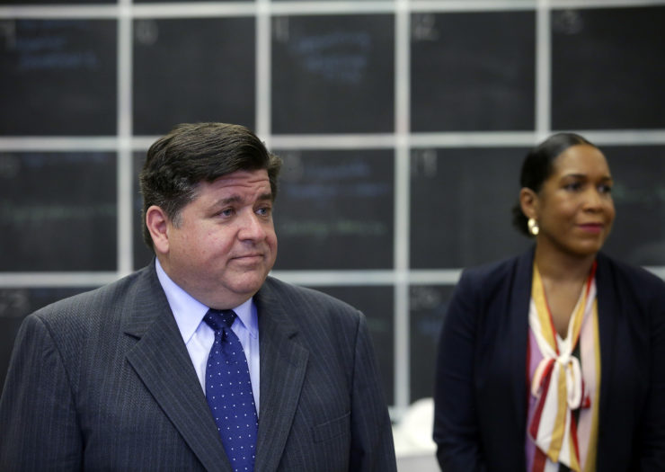 2018 photo of Illinois Governor J.B. Pritzker on the left standing next to Lt. Gov. Juliana Stratton