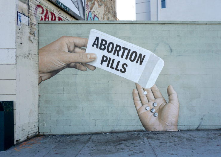 Photo of a mural of abortion pills
