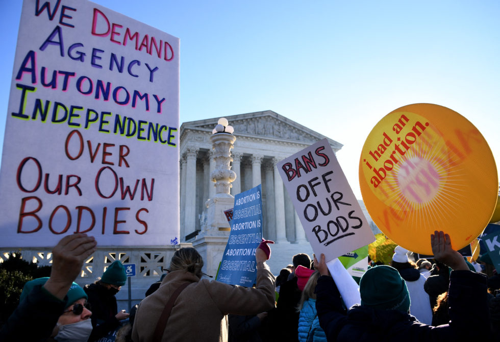 Photo of abortion rights advocates demonstrating in front of the Supreme Court