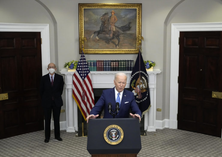 Photo of Joe Biden in the foreground with Justice Stephen Breyer in the background