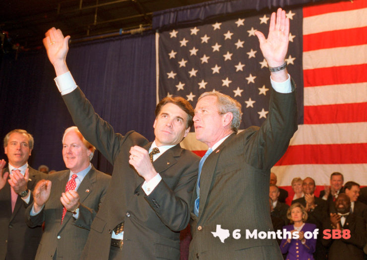 2002 photo of Rick Perry and George W. Bush