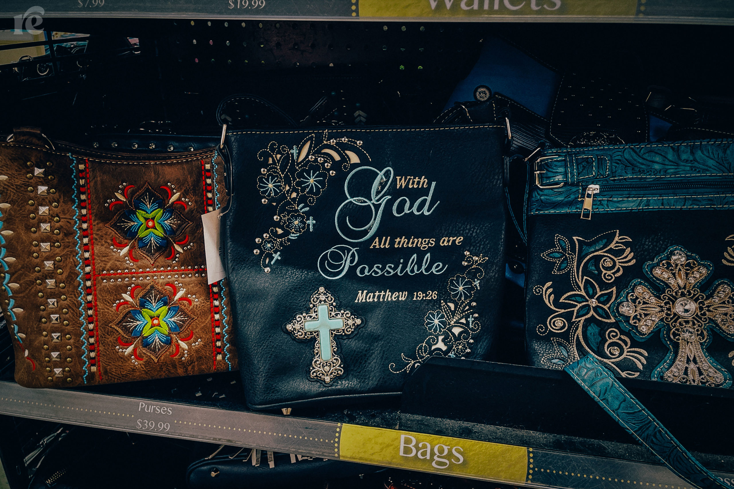 Photo of purse that says With God all things are possible
