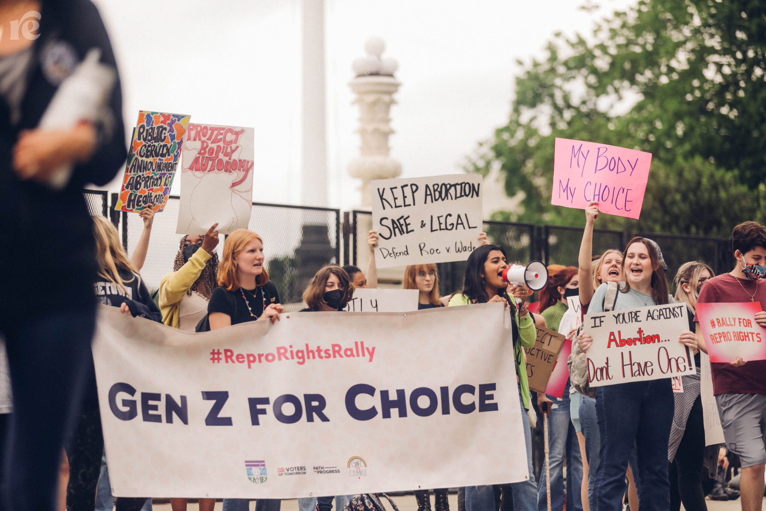 Photo of Youth Rally protest holding sign that says Gen Z for Choice