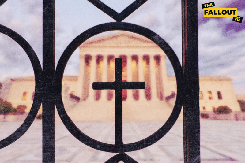Supreme Court behind a gate with a cross church